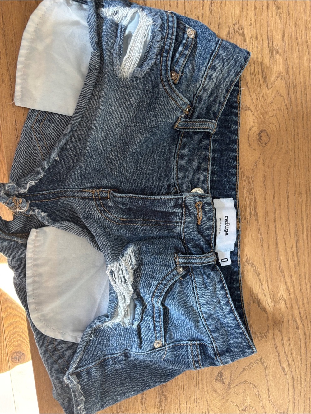 refuge Washed Blue Distressed Denim Cutoff Shorts